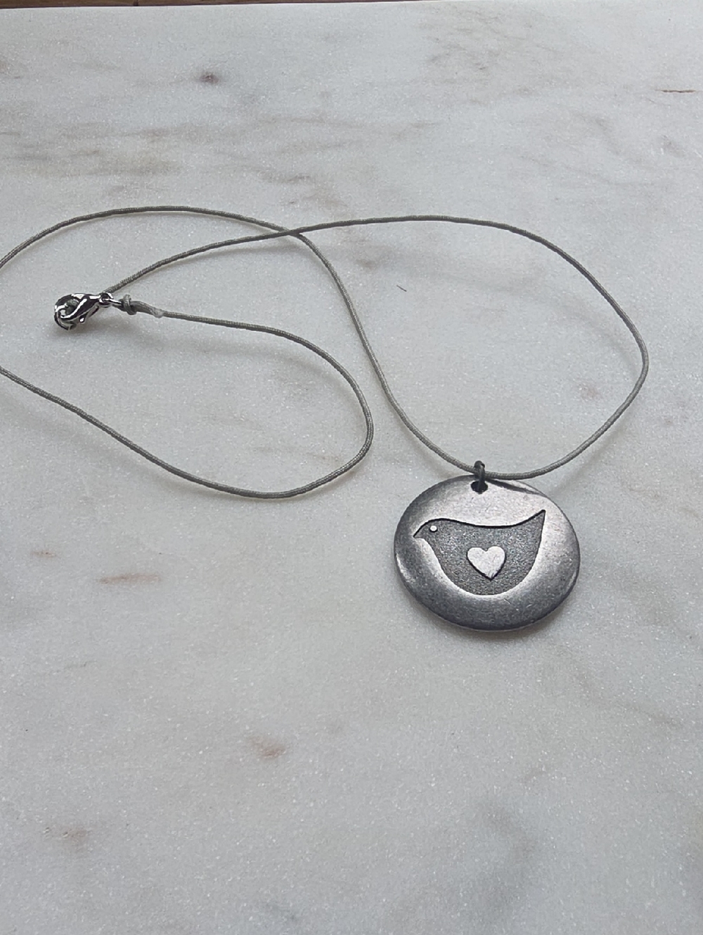 Vintage Hallmark dove bird with a heart pendant necklace